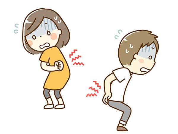 腰が痛い男女のイラスト